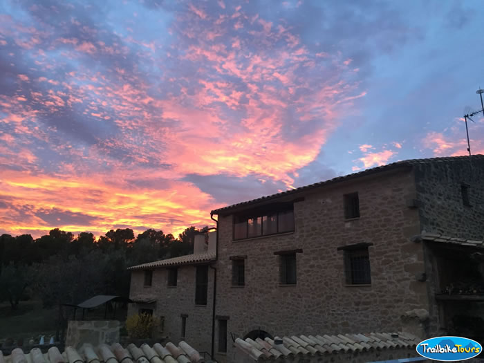 Orange skies above the farmhouse